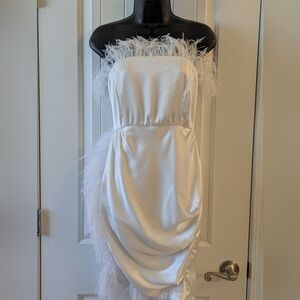 Club London white feather trim bandeau mini dress.